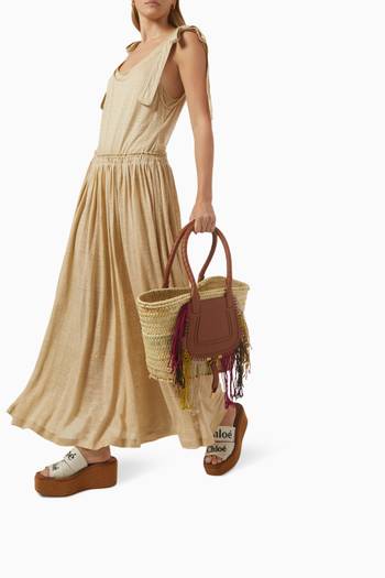 hover state of Marcie Medium Tote Bag in Hand-braided Raffia