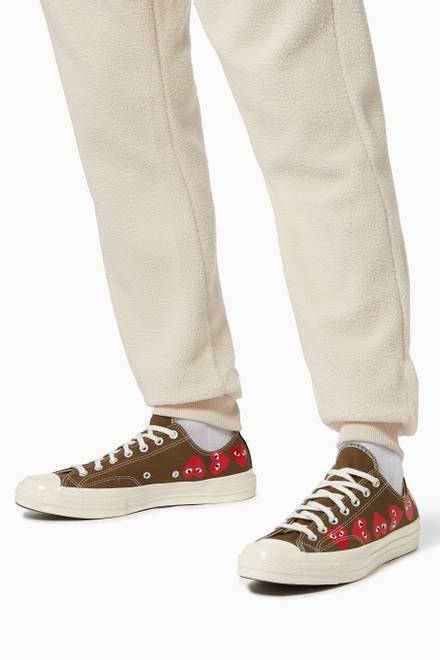 hover state of x Converse Chuck Taylor 70 Low-Top Sneakers