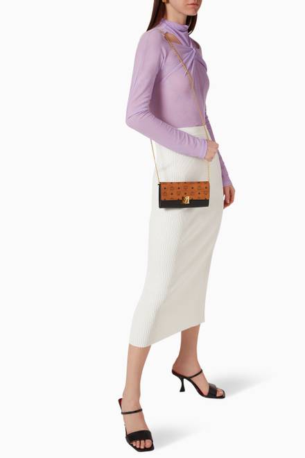 hover state of Large Mena Crossbody Wallet in Visetos & Leather    