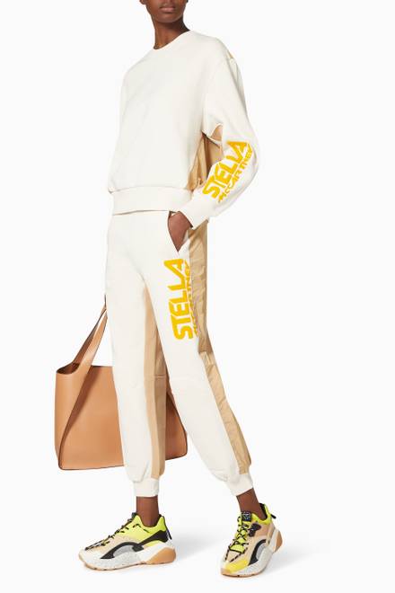 hover state of Stella McCartney Logo Tracksuit Pants in Organic Cotton  